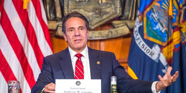 In this Nov. 18, photo provided by the Office of Governor Andrew M. Cuomo, Gov. Cuomo holds a press briefing on the coronavirus in the Red Room at the State Capitol in Albany, N.Y.