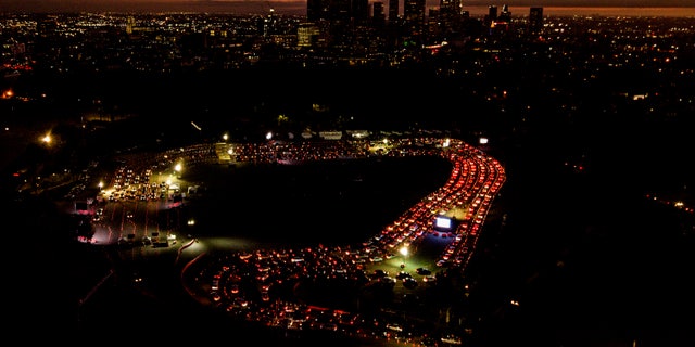 US COVID testing sites see miles-long lines, delays ahead of holidays 3 In this Nov 18 photo, motorists wait in long lines to take a coronavirus test in a parking lot at Dodger Stadium in Los Angeles. With coronavirus cases surging and families hoping to gather safely for Thanksgiving, long lines to get tested have reappeared across the U.S. (AP Photo/Ringo H.W. Chiu, File)
