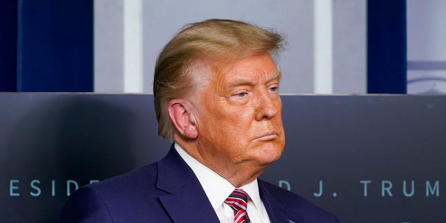 FILE - In this Nov. 20, 2020, file photo President Donald Trump listens during a news conference in the briefing room at the White House in Washington. (AP Photo/Susan Walsh, File)