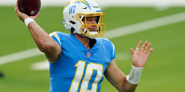 Los Angeles Chargers quarterback Justin Herbert passes against the New York Jets during the first half of an NFL football game Sunday, Nov. 22, 2020, in Inglewood, Calif. (AP Photo/Jae C. Hong)