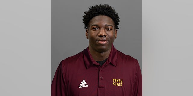 This undated image provided by Texas State University shows NCAA college football player Khambrail Winters. Winters was fatally shot Tuesday, Nov. 24, 2020, and two men have been arrested and charged in the killing. (Texas State University, via AP)
