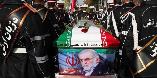 In this photo published by the official website of the Iranian Ministry of Defense, soldiers stand near the flag-draped coffin of Mohsen Fakhrizadeh, a scientist killed on Friday, during a funeral ceremony in Tehran, Iran, on Monday, November 30. .  2020. Fakhrizadeh founded Iran's military nuclear program two decades ago, and the Minister of Defense of the Islamic Republic has pledged to continue the work of man. "with more speed and more power." (Iranian Ministry of Defense via AP)