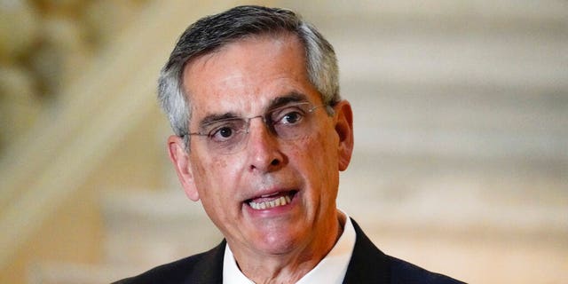 Georgia Secretary of State Brad Raffensperger speaks during a news conference on Monday, Nov. 30, 2020, in Atlanta. (AP Photo/Brynn Anderson)