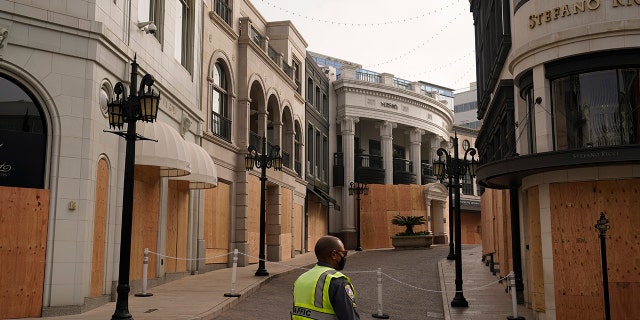 Luxury shops on Rodeo Drive are boarded up in anticipation of possible violent protests on Election Day Tuesday, Nov. 3, 2020, in Beverly Hills, Calif. (AP Photo/Jae C. Hong)