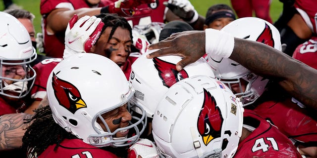 The Arizona Cardinals celebrate after their game winning touchdown against the Buffalo Bills during the second half of an NFL football game, Sunday, Nov. 15, 2020, in Glendale, Ariz. The Cardinals won 32-20. (AP Photo/Ross D. Franklin)