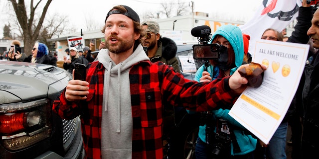 Adam Skelly, of Adamson Barbecue in Toronto, Ontario, is asking the media to leave his restaurant property on Wednesday after the city has repeatedly opened its facility for indoor dining despite the city’s corona virus restrictions.