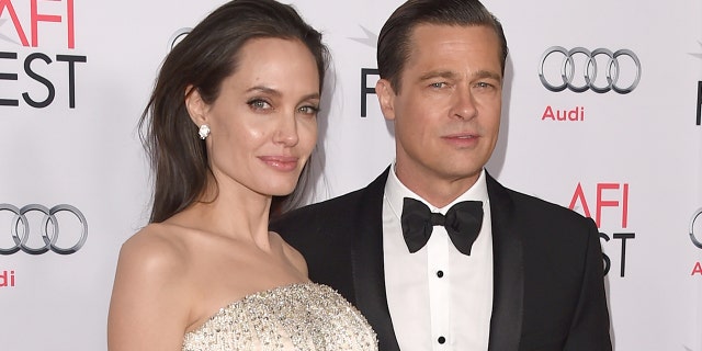 Angelina Jolie (left) and Brad Pitt (right) are in the midst of divorce proceedings. They married in 2014 and share six children. (Photo by Jason Merritt/Getty Images)