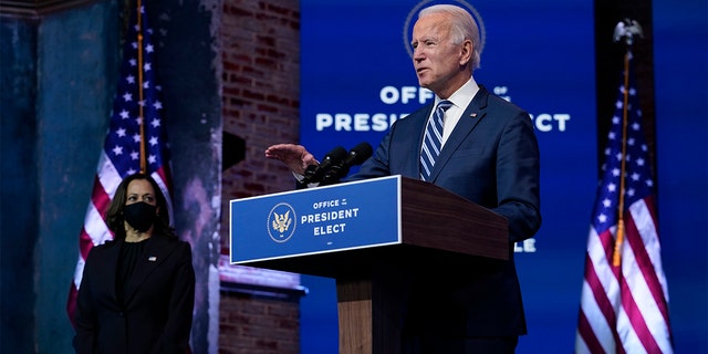 President-elect Joe Biden, joined by Vice President-elect Kamala Harris, speaks at The Queen Theater, Tuesday, Nov. 10, 2020, in Wilmington, Del. (AP Photo/Carolyn Kaster)