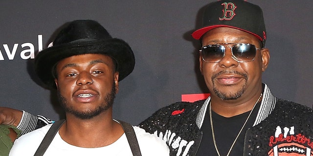 Bobby Brown and Bobby Brown Jr. pose together at an event prior to the latter's death at age 28.