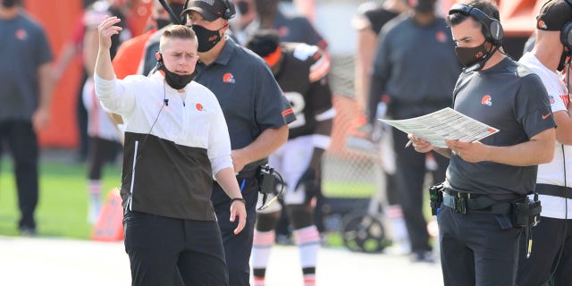 This Sept. 27, 2020, file photo shows Cleveland Browns chief of staff Callie Brownson, left, reacting on the sideline during an NFL football game against the Washington Football Team, in Cleveland. (AP Photo/David Richard, File)