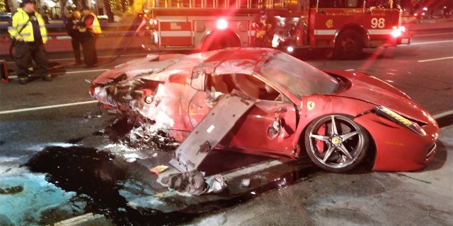 Chicago firefighters say a red Ferrari rented for the weekend crashed on Lake Shore Drive after wiping out at turn.