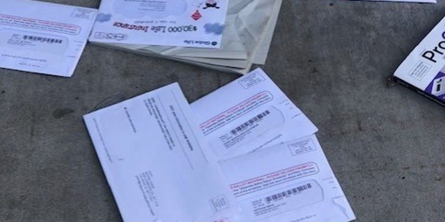 Mass-mail-in ballots litter the sidewalk outside a Las Vegas apartment building, October 2020. Photo courtesy of Jim Murphy.