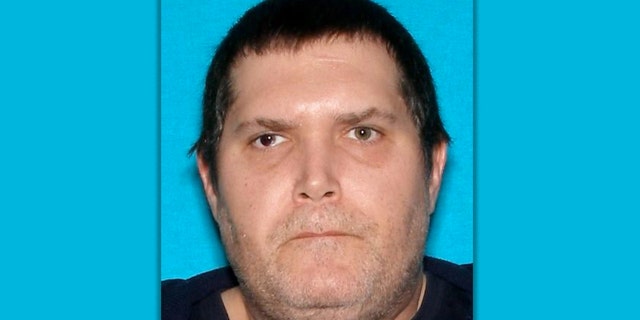 Douglas Earl, 48, of Frankfort, was arrested for allegedly assaulting two poll workers on Saturday, according to police.