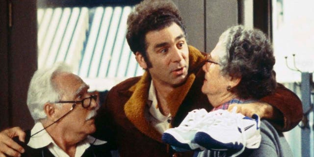 Left to right: Michael Robello as Pop, Michael Richards as Cosmo Kramer and Elsa Raven as Mom in an episode of 'Seinfeld.' (Photo by J. Delvalle/NBCU Photo Bank/NBCUniversal via Getty Images)