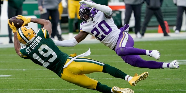 Green Bay Packers' Equanimeous St. Brown can't catch a pass with Minnesota Vikings' Jeff Gladney defending during the second half of an NFL football game Sunday, Nov. 1, 2020, in Green Bay, Wis. (AP Photo/Morry Gash)