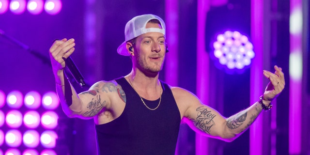 Tyler Hubbard is in quarantine on his tour bus outside his house. 