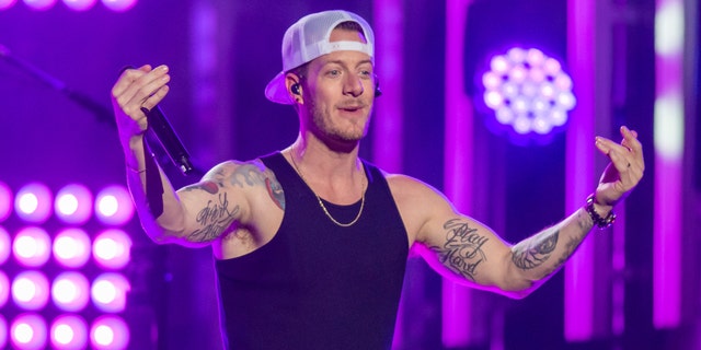 Tyler Hubbard is in quarantine on his tour bus outside his house. 