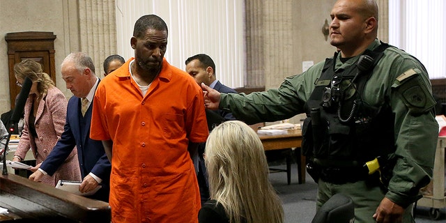 Singer R. Kelly turns to leave after appearing at a hearing at the Leighton Criminal Courthouse on September 17, 2019 in Chicago, Illinois. Kelly is facing multiple sexual assault charges and is being held without bail.   