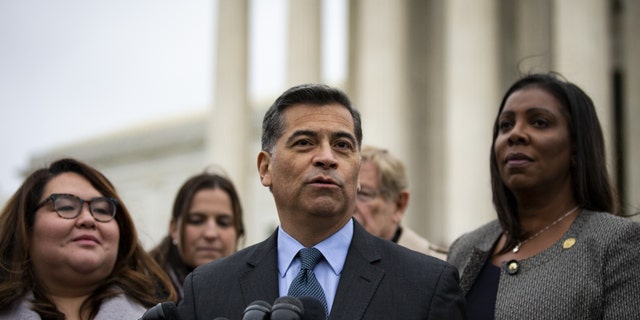 Xavier Becerra, California's attorney general, center, speaks during a news conference outside the Supreme Court in Washington, D.C., U.S., on Tuesday, Nov. 12, 2019. Photographer: Al Drago/Bloomberg via Getty Images