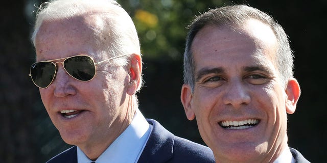 FILE - Joe Biden walks with Los Angeles Mayor Eric Garcetti at a campaign event at United Firefighters of Los Angeles City on January 10, 2020 in Los Angeles. (Photo by Mario Tama/Getty Images)