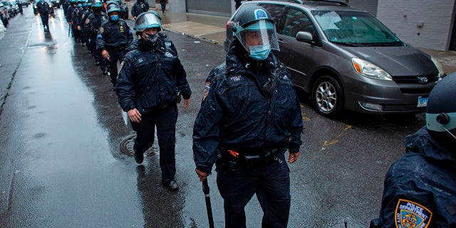 New York Police Department officers patrol during a protest against the Far Right on November 1, 2020, in New York City. (KENA BETANCUR/AFP via Getty Images)