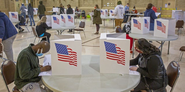 Voters at a polling location for the 2020 presidential election in Ankeny, Iowa, on Nov. 3, 2020.