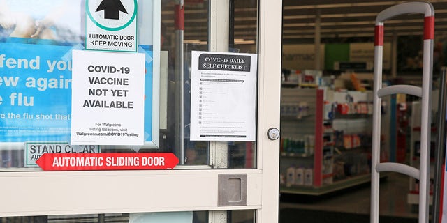 HOUSTON, Nov. 25, 2020 -- A notice telling COVID-19 vaccine is not yet available is pictured on the door of a pharmacy in New Orleans, Louisiana, the United States, (Photo by Lan Wei/Xinhua via Getty) (Xinhua/Wei Lan via Getty Images)