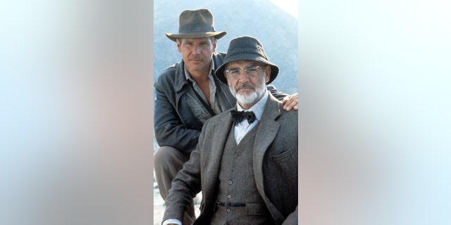 Harrison Ford and Sean Connery on the set of the film "Indiana Jones And The Last Crusade" in 1989. ​Connery died on Oct. 31, 2020, at age 90.