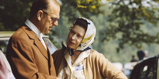 The Duke of Edinburgh, Queen Elizabeth II’s husband of 73 years, died on April 9, 2021. Here, the queen and Prince Philip chatting during the royal windsor horse show on the grounds of Windsor Castle years ago.