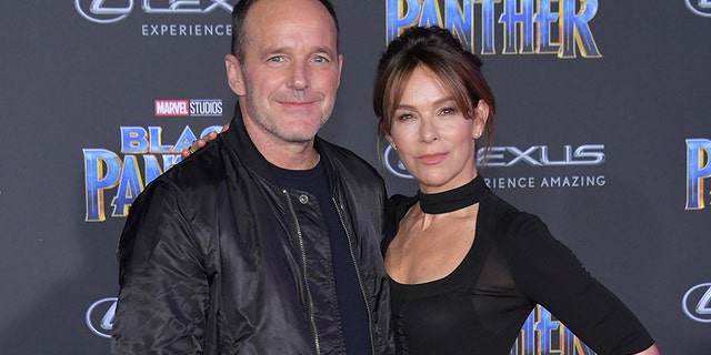 Clark Gregg and Jennifer Grey attend the premiere of Disney and Marvel's 'Black Panther' at Dolby Theatre on Jan. 29, 2018, in Hollywood, Calif.