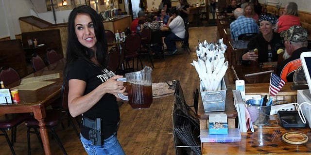 RIFLE, CO - MAY 29: Lauren Boebert, owner of the Shooters Grill, has gained national attention for her decision to encourage her staff to carry a firearm during work on May 29, 2018 in Rifle, Colorado. (Photo by RJ Sangosti/The Denver Post via Getty Images)