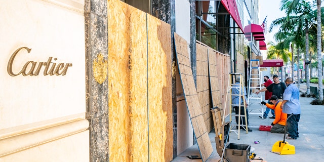 Workers were seen Monday boarding up the Cartier store on Rodeo Drive as a precautionary measure in preparation for the 2020 Presidential Election on Tuesday, Nov. 3 in Beverly Hills, Calif. (Photo by AaronP/Bauer-Griffin/GC Images)