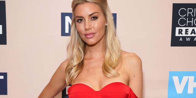 Heather Rae Young fired back at a fan who accused her of making her husband "her entire personality."