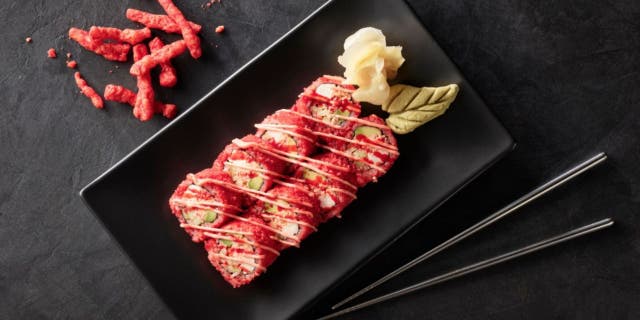 The sushi chain Hissho Sushi has partnered with snack maker Frito-Lay to create a new Cheetos Flamin’ Hot Roll. (Hissho Sushi)