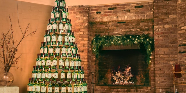 Jameson Irish Whiskey is giving away Christmas "trees" made with over 100 of its whiskey bottles and a unique lighting system. (Jameson)