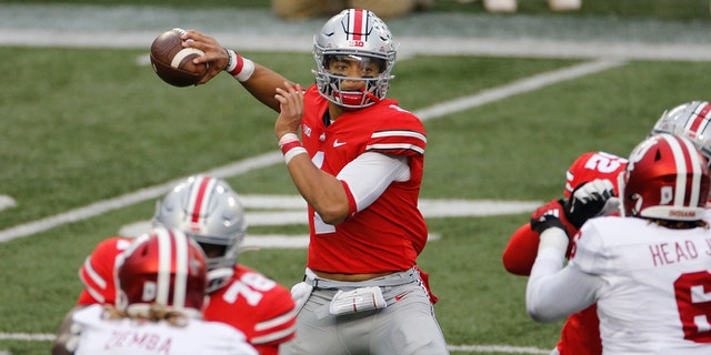 Ohio State quarterback Justin Fields throws a pass against Indiana during the first half of an NCAA college football game on Saturday, November 21, 2020 in Columbus, Ohio.  (Associated press)