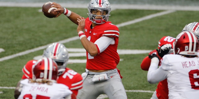 Ohio State quarterback Justin Fields throws a pass against Indiana during the first half of an NCAA college football game Saturday, Nov. 21, 2020, in Columbus, Ohio. (Associated Press)