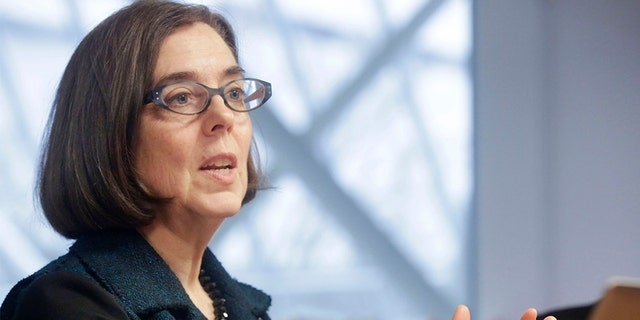 Kate Brown, governor of Oregon, speaks during an interview in Portland, Oregon, U.S. on Wednesday, Jan. 20, 2016. Brown, a Democrat, joined the state House of Representatives in 1991, was later elected to the Senate and served as secretary of state since 2009, before taking over as governor in February. Photographer: Meg Roussos/Bloomberg via Getty Images
