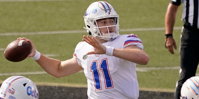 Florida quarterback Kyle Trask (11) passes against Vanderbilt in the first half of an NCAA college football game Saturday, Nov. 21, 2020, in Nashville, Tenn. (AP Photo/Mark Humphrey)