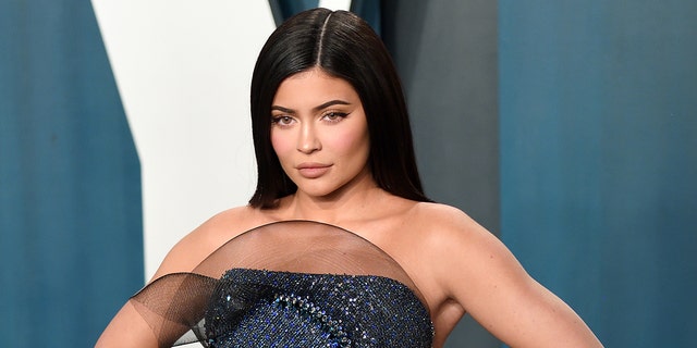 Kylie Jenner promoted her Grinch-themed makeup line with some sultry bikini snaps on Instagram. (Photo by Karwai Tang/Getty Images)