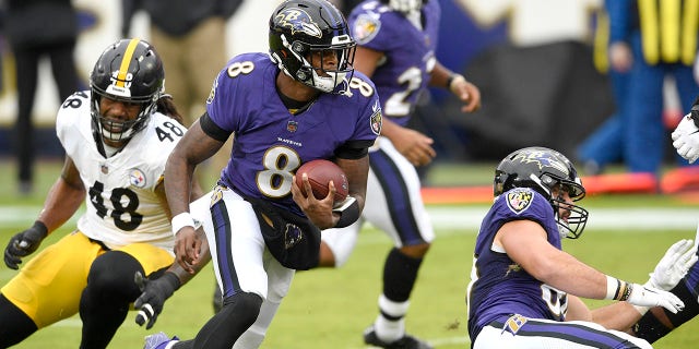 Baltimore Ravens quarterback Lamar Jackson (8) scrambles against the Pittsburgh Steelers during the first half of an NFL football game, Sunday, Nov. 1, 2020, in Baltimore. (AP Photo/Nick Wass)