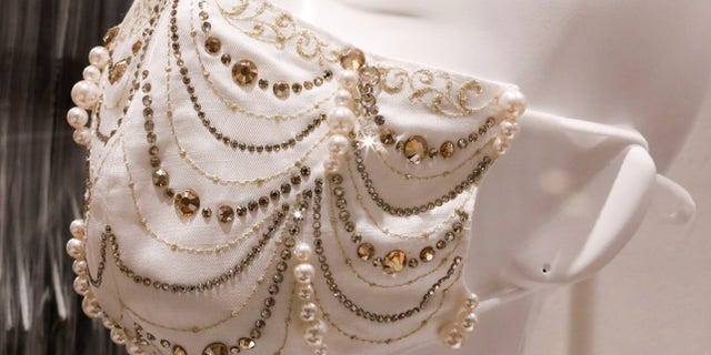 Japanese face mask company Mask.com is selling a mask that features 0.70-carat diamonds for $9,600. (Reuters/Issei Kato)