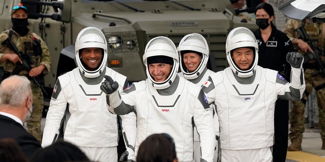 Astronauts, from left, Victor Glover, Michael Hopkins, Shannon Walker and Japan Aerospace Exploration Agency astronaut Soichi Noguchi. (AP Photo/John Raoux).