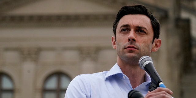 Democratic candidate for U.S. Senate Jon Ossoff speaks during a news conference on Tuesday, Nov. 10, 2020, in Atlanta. He is facing Republican Sen. David Perdue, a top Trump ally, in a Jan. 5, 2021 runoff. (AP Photo/John Bazemore)