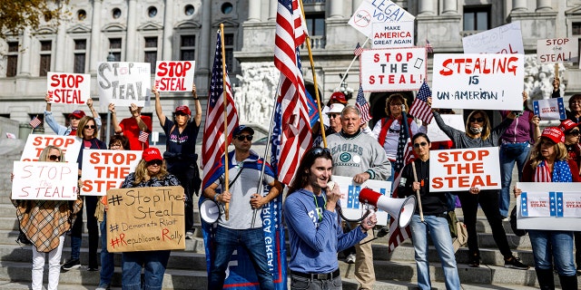 Rally organizer Scott Presler speaks at a pro-Trump rally at the Pennsylvania state Capitol in Harrisburg, Pa., Friday, Nov. 5, 2020. (Dan Gleiter/The Patriot-News via AP)