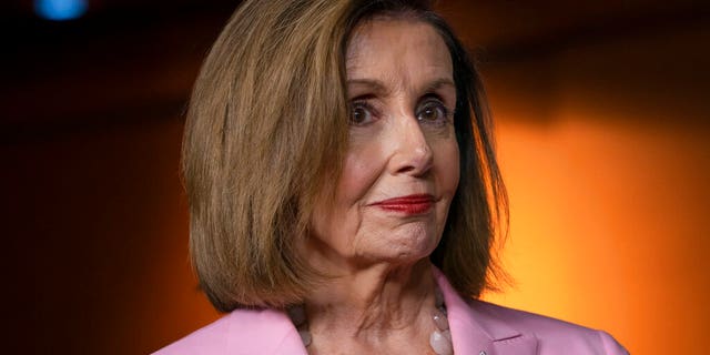 FILE: Speaker of the House Nancy Pelosi, D-Calif., leads other House Democrats to discuss H.R. 1, the For the People Act, which passed in the House but is being held up in the Senate, at the Capitol in Washington, Friday, Sept. 27, 2019. (AP Photo/J. Scott Applewhite)