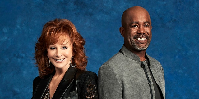 Reba McEntire and Darius Rucker host the 2020 CMAs (Alysse Gafkjen via Getty Images)