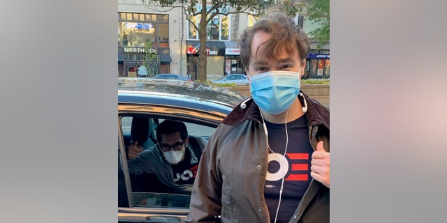 Ducklo, in the car, and Bates, right, during the Biden campaign.