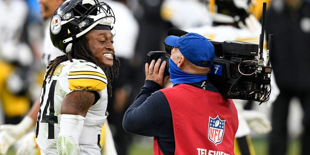 Pittsburgh Steelers strong safety Terrell Edmunds (34) smiles for a television camera after an NFL football game against the Baltimore Ravens, Sunday, Nov. 1, 2020, in Baltimore. The Steelers won 28-24. (AP Photo/Nick Wass)