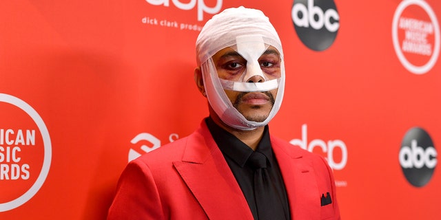 The Weeknd appeared at the 2020 AMAs with a bloody, bandaged face.